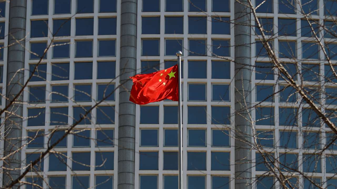 Chinese flag flutters outside the foreign ministry in Beijing