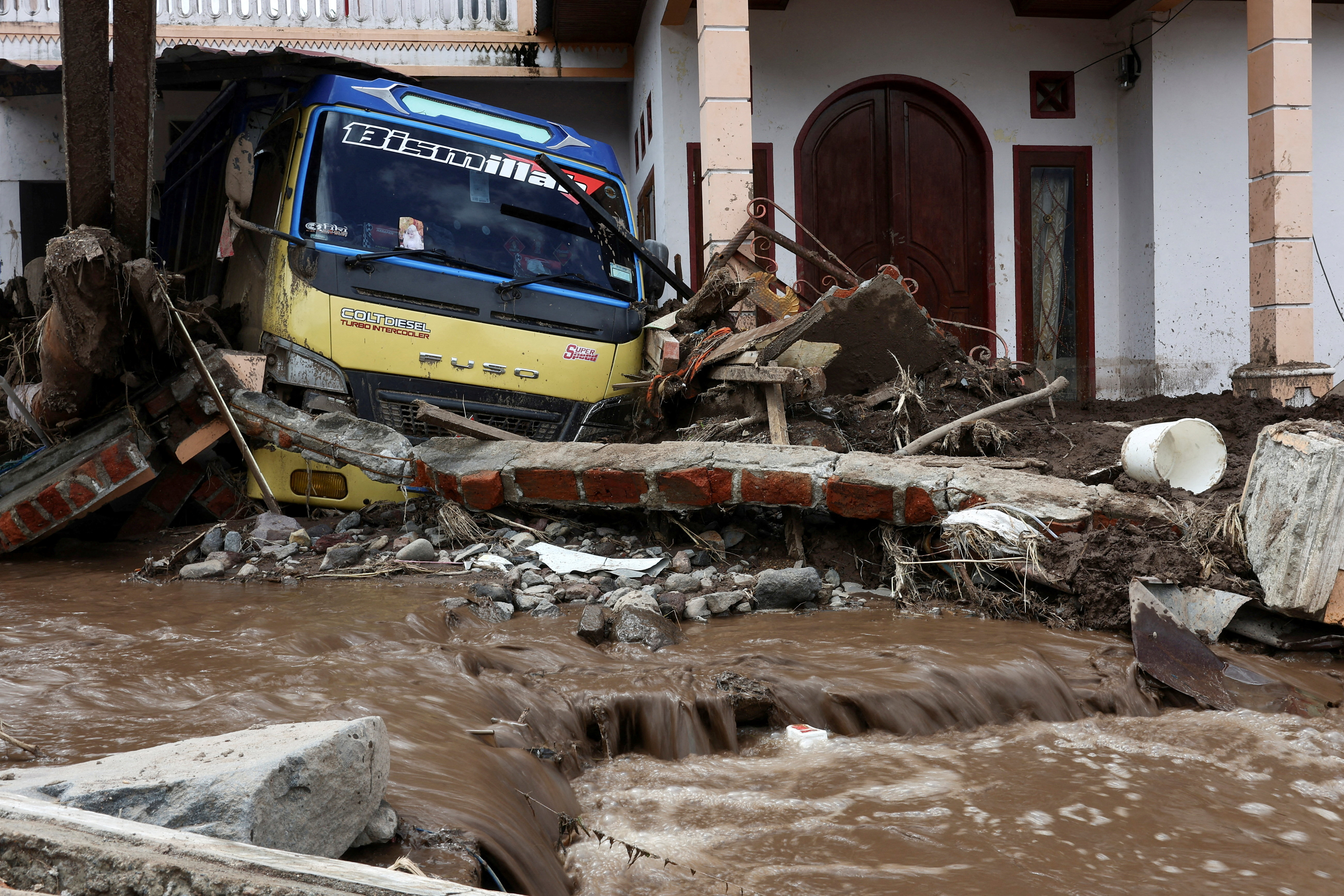 FILE PHOTO: Aftermath of deadly landslides in Malalak, Indonesia