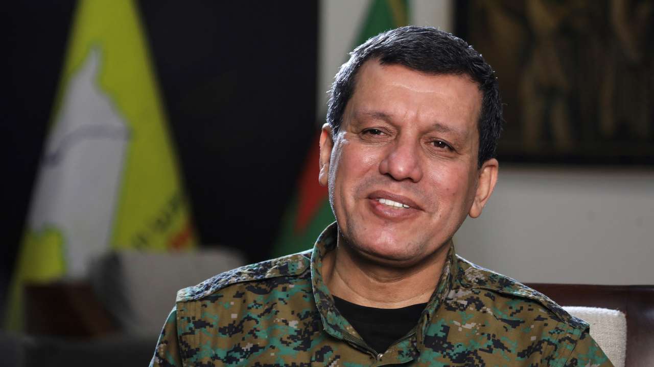 FILE PHOTO: Commander of Syrian Kurdish-led forces Mazloum Abdi, attends an interview with Reuters in Hasakah