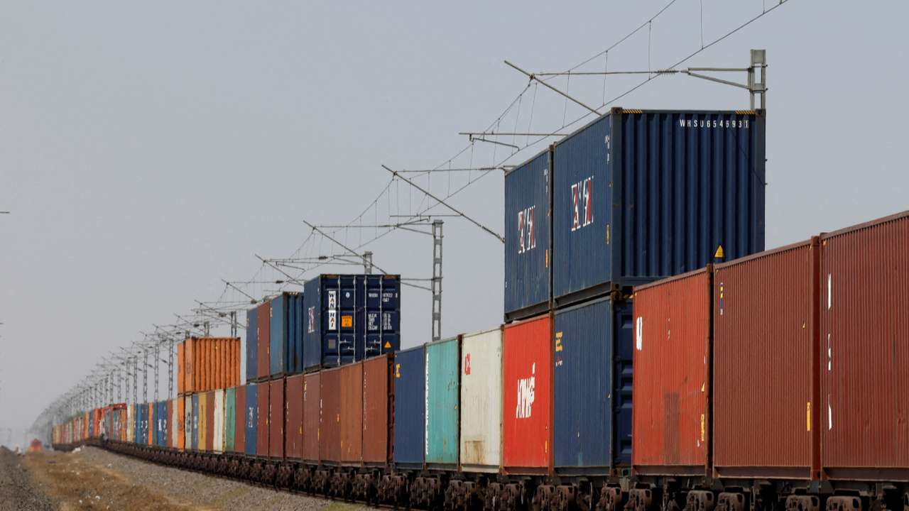 FILE PHOTO: Containers are transported by train near the Deendayal Port in Kandla