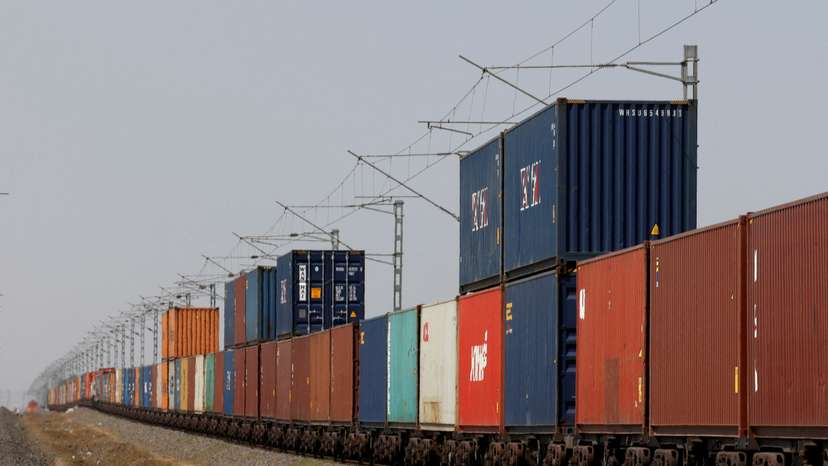 FILE PHOTO: Containers are transported by train near the Deendayal Port in Kandla
