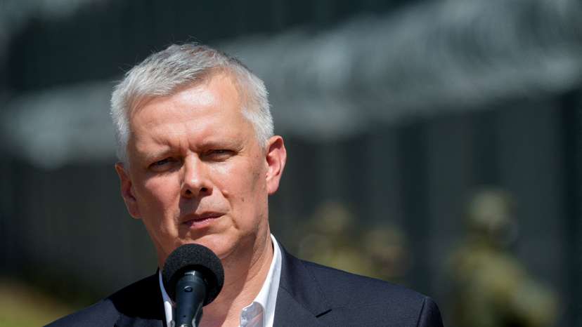 FILE PHOTO: Tomasz Siemoniak, Poland's minister in charge of special services, speaks to the press during a visit to the Polish-Belarusian border crossing Polowce-Pyaschatka, Poland