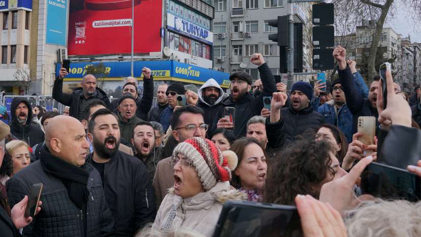 Supporters of Istanbul Mayor Ekrem Imamoglu gather near the city's police headquarters in Istanbul