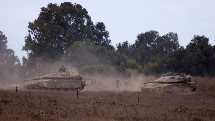 Israeli Army tanks are being moved, in the Israeli-occupied Golan Heights