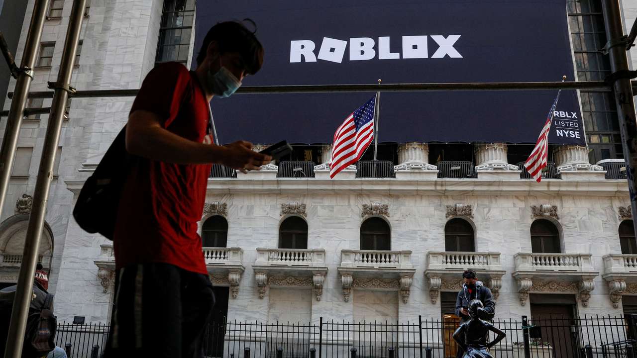 The Roblox logo is displayed on a banner at the NYSE in New York