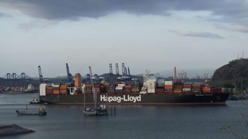 A cargo ship sails through the Panama Canal