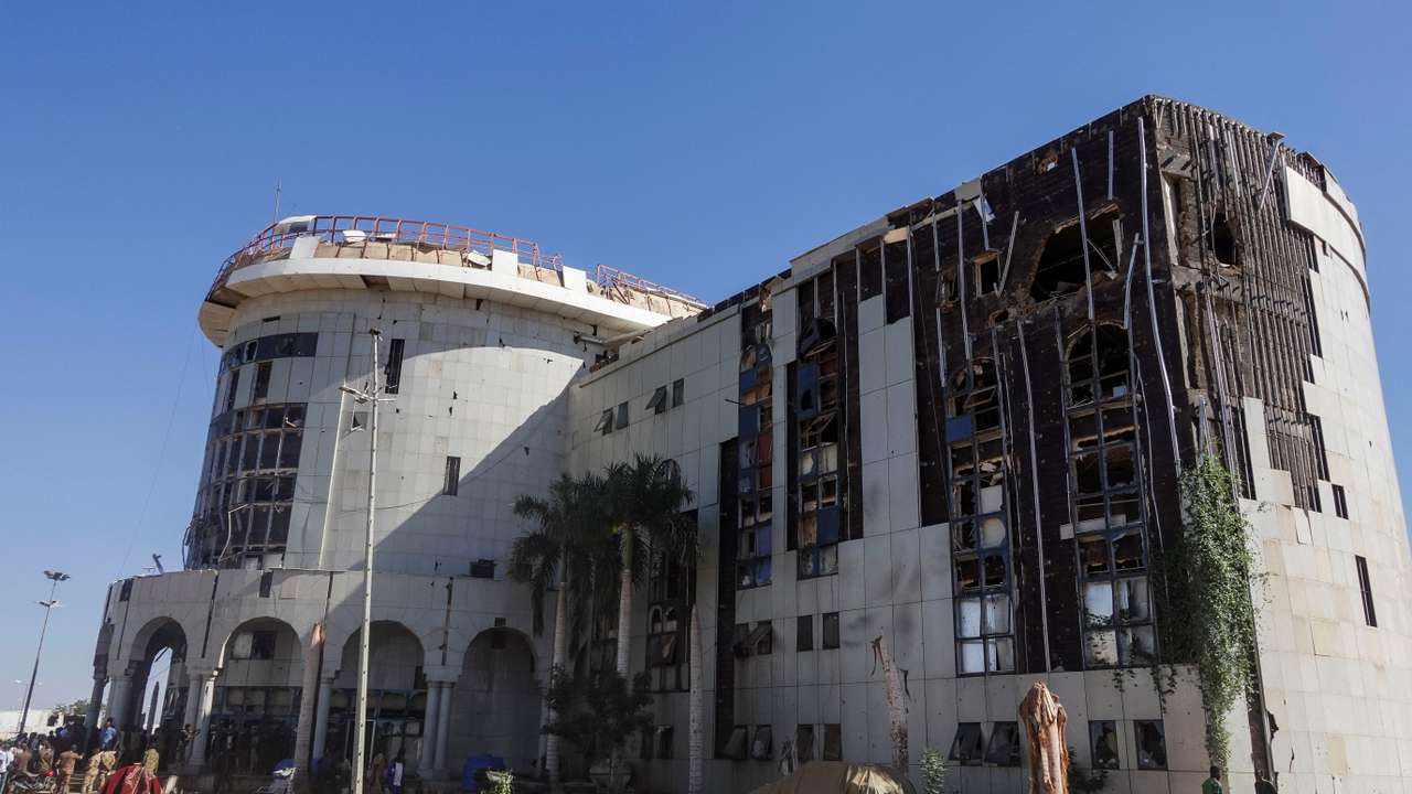 The Sudanese Army General Command building bears traces of artillery shelling in Khartoum