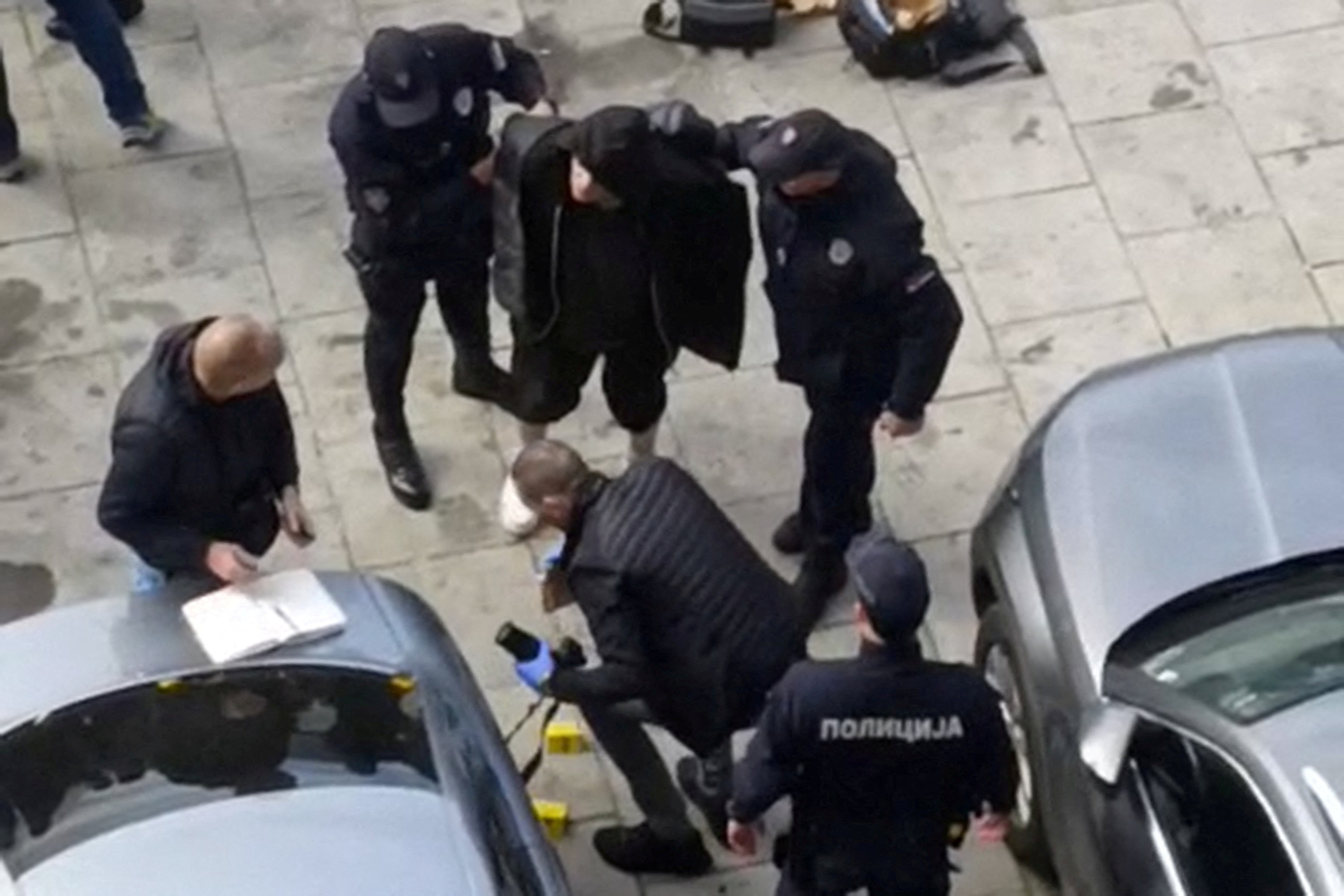 Shots fired outside Serbian parliament, one man detained, local media report