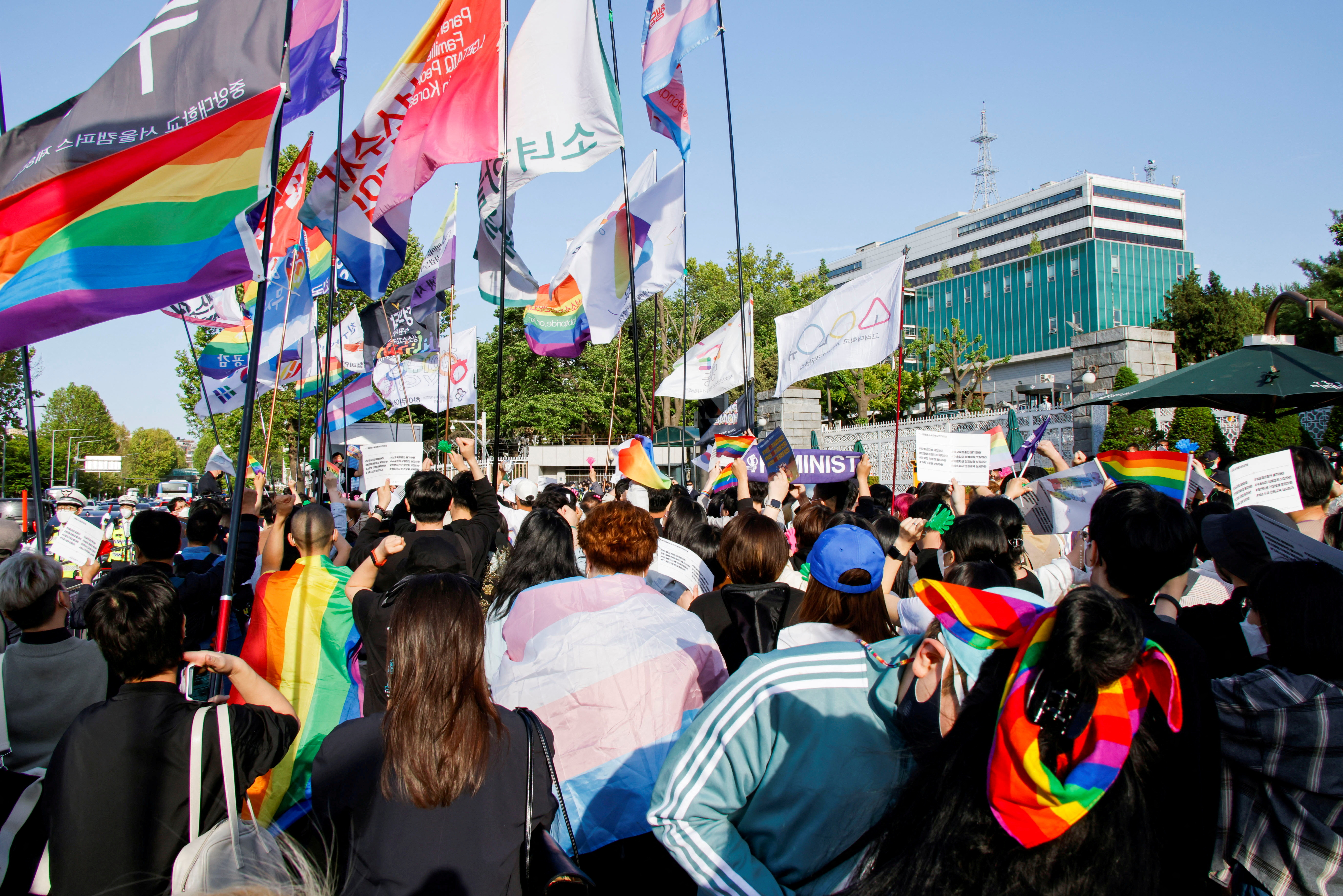 FILE PHOTO: Members of the LGBTQ+ community march in front of the new Presidential office during a protest ahead of the International Day Against Homophobia, Transphobia and Biphobia, in Seoul