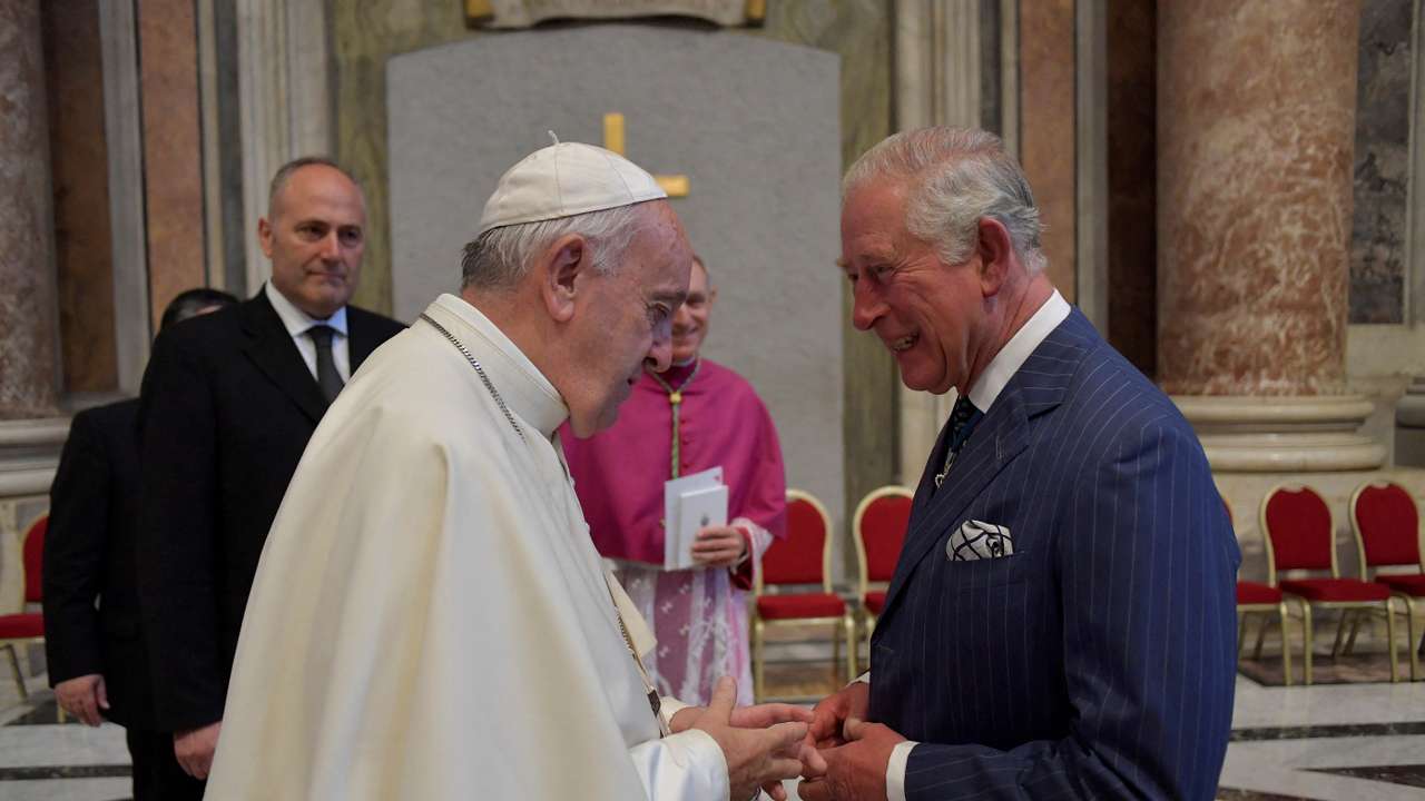 FILE PHOTO: Pope Francis speaks with Britain's Prince Charles at the Vatican