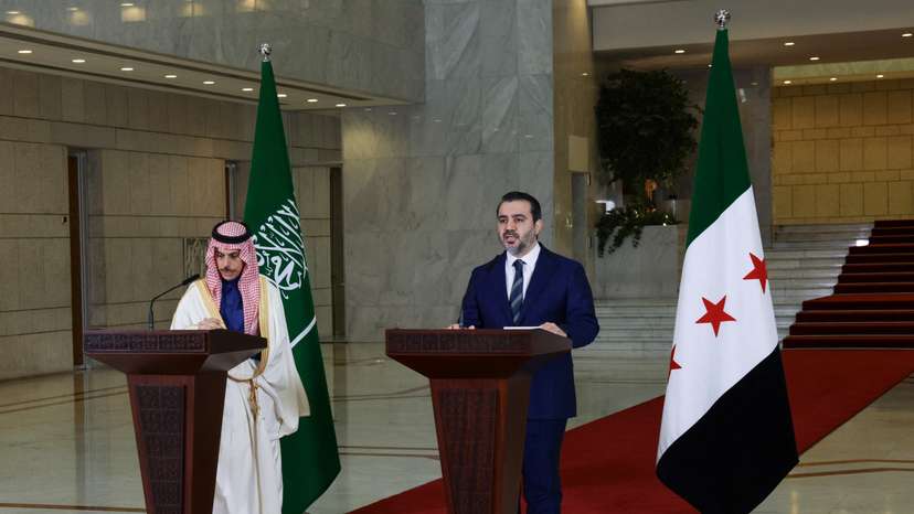 Saudi Arabia's Foreign Minister Prince Faisal bin Farhan Al-Saud attends a press conference with Syrian Foreign Minister Asaad Hassan al-Shibani in Damascus