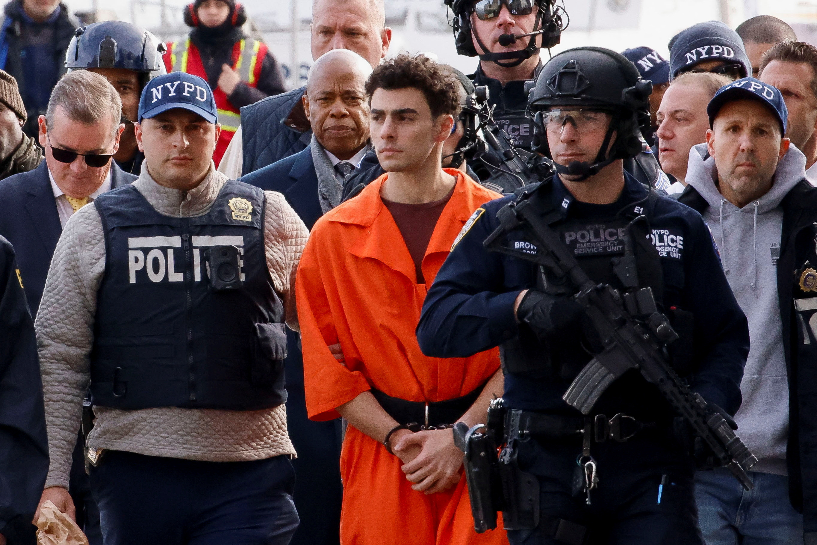 Luigi Mangione arrives at a helicopter pad after being extradited from Pennsylvania, in New York