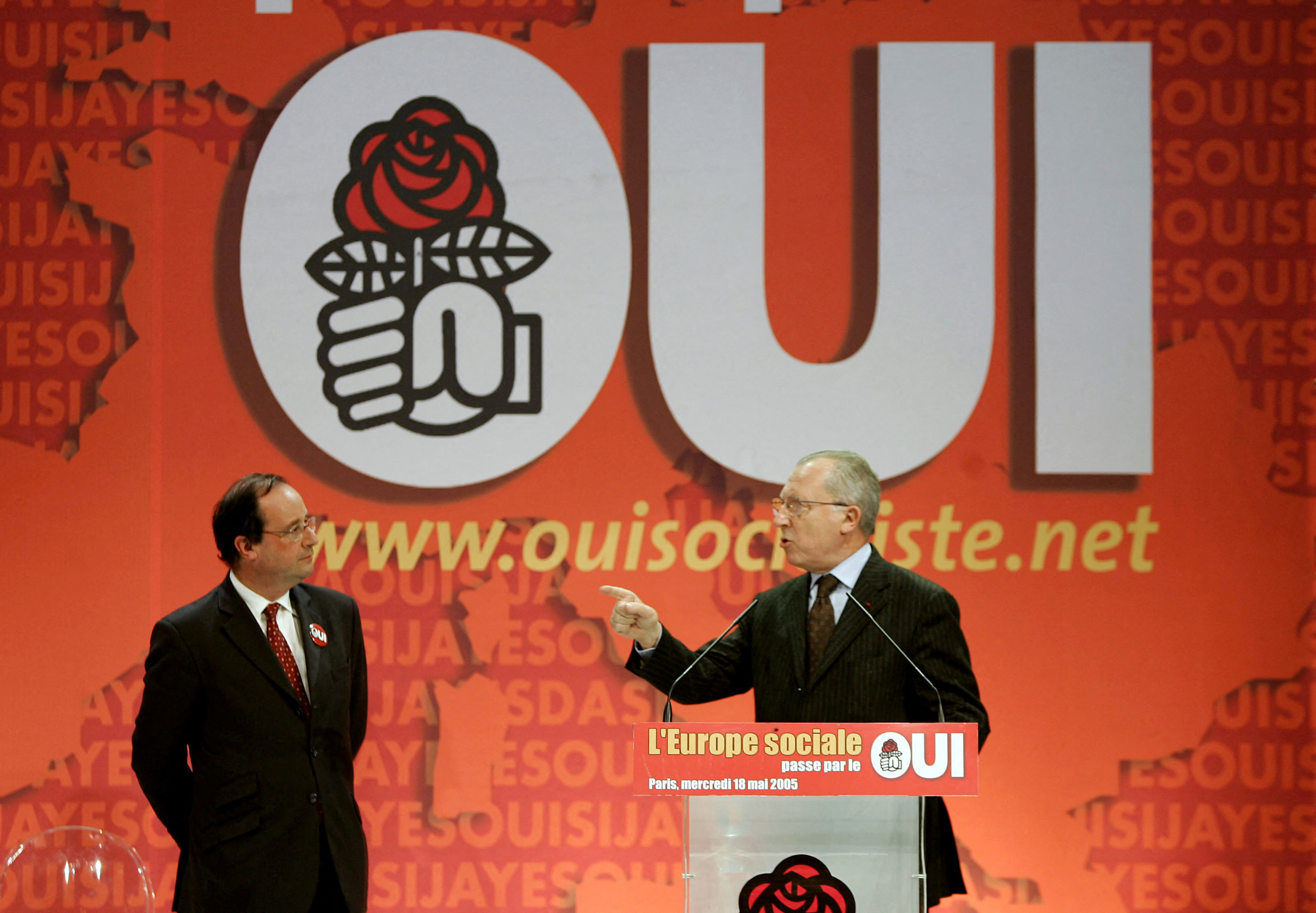 FILE PHOTO: Former French minister Jacque Delors delivers his speech next to French Socialist leader Francois ...