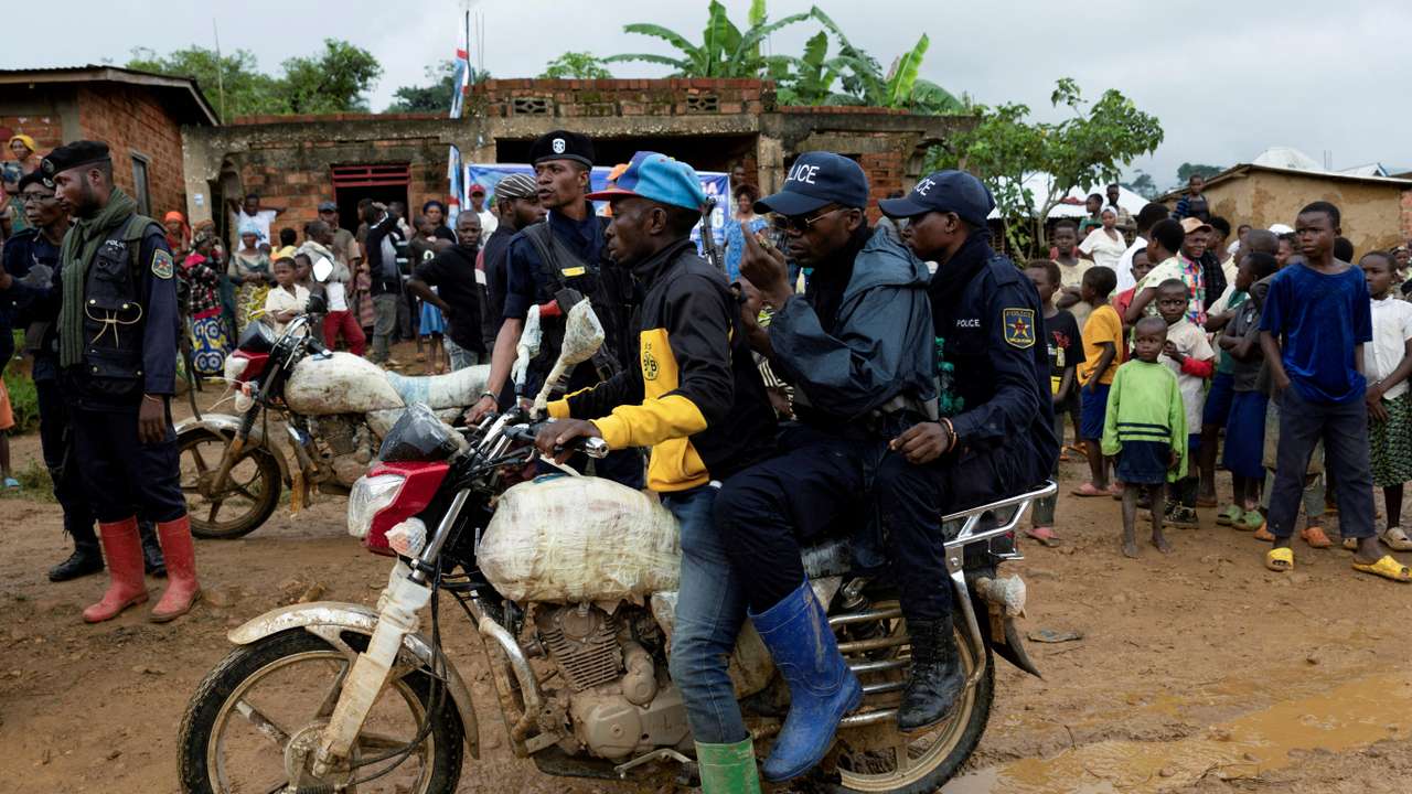 FILE PHOTO: Congolese police officers secure the streets during a campaign rally of presidential candidate Moise Katumbi in Kitutu village, South Kivu province, Democratic Republic of the Congo