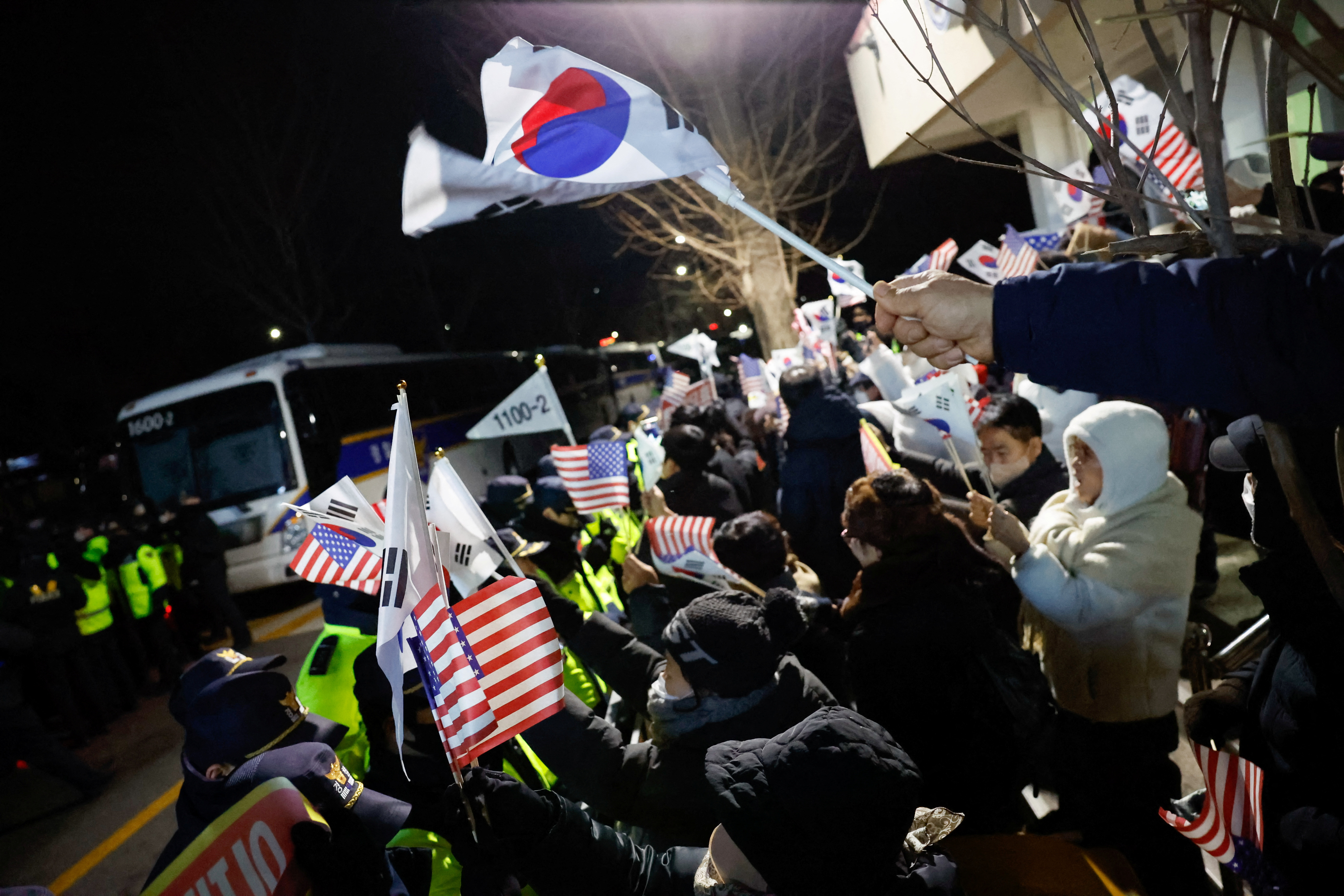 Scenes from outside the Seoul Detention Center in Uiwang
