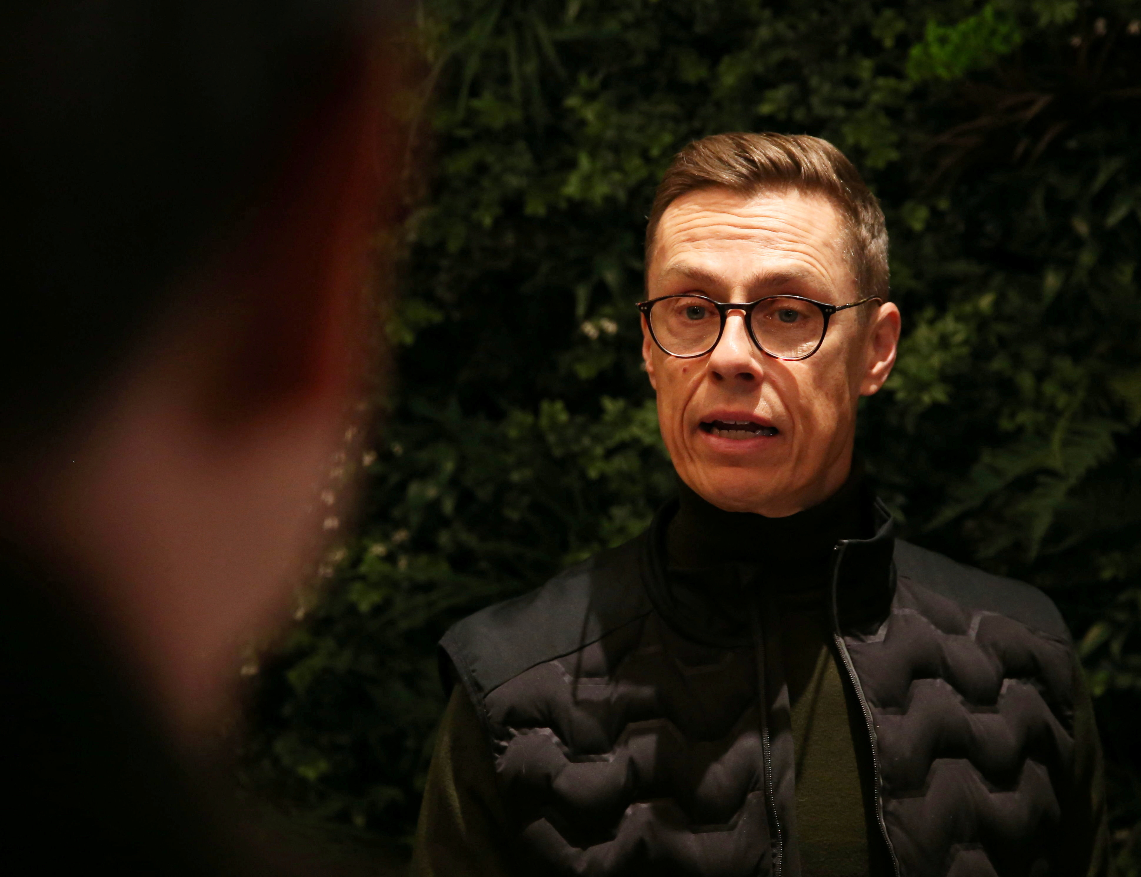 Finnish presidential election candidate Alexander Stubb of the National Coalition Party talks to members of the media in Espoo