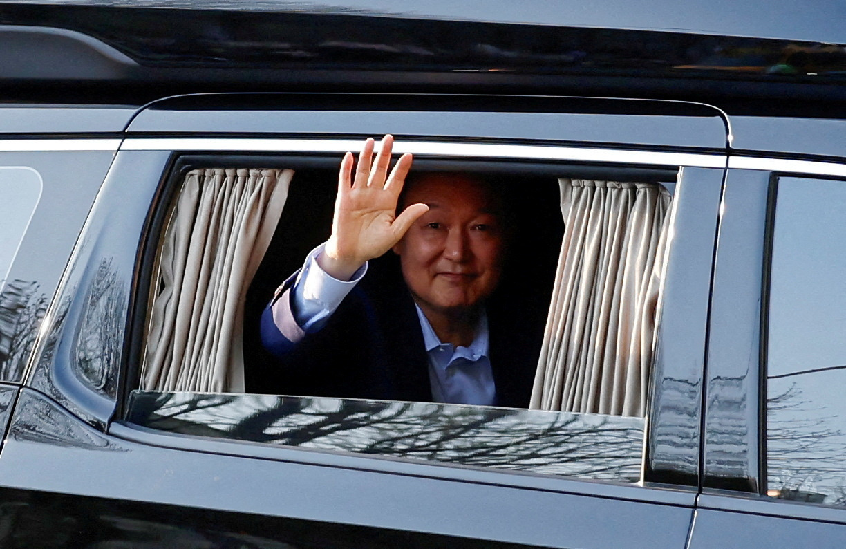 FILE PHOTO: South Korea's ousted president Yoon arrives at his private residence, in Seoul
