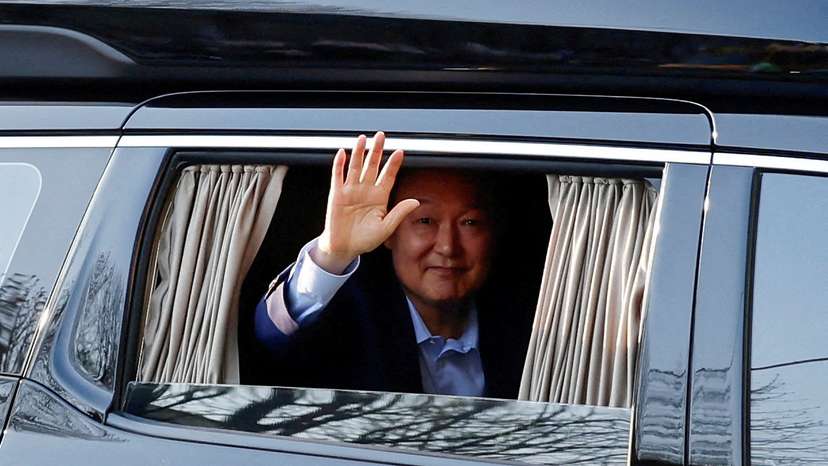 FILE PHOTO: South Korea's ousted president Yoon arrives at his private residence, in Seoul