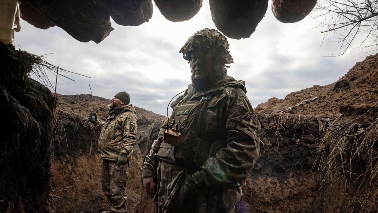 Ukraine builds barricades, digs trenches as focus shifts to defence