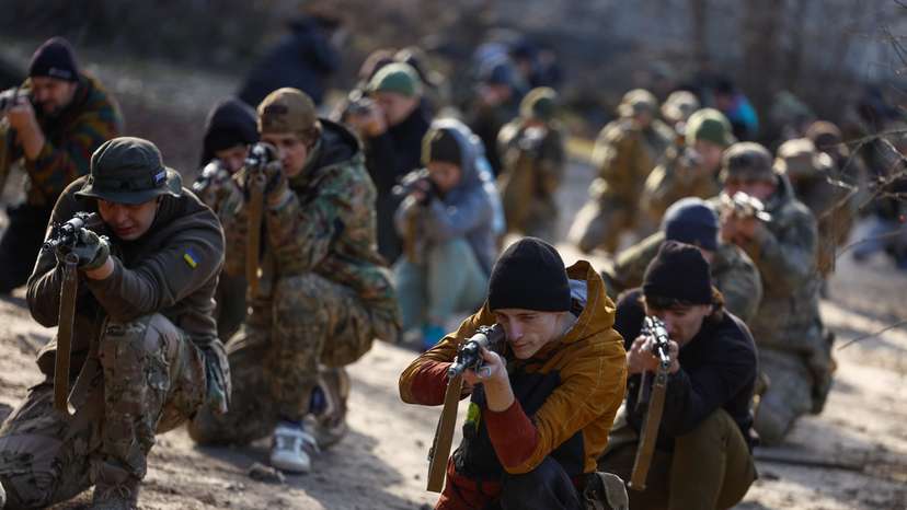 Potential recruits who aspire to join the 3rd Separate Assault Brigade of the Ukrainian Armed Forces take part in a testing basic military course in Kyiv