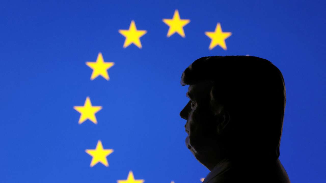 Illustration shows 3D-printed miniature model of U.S. President Donald Trump and EU flag