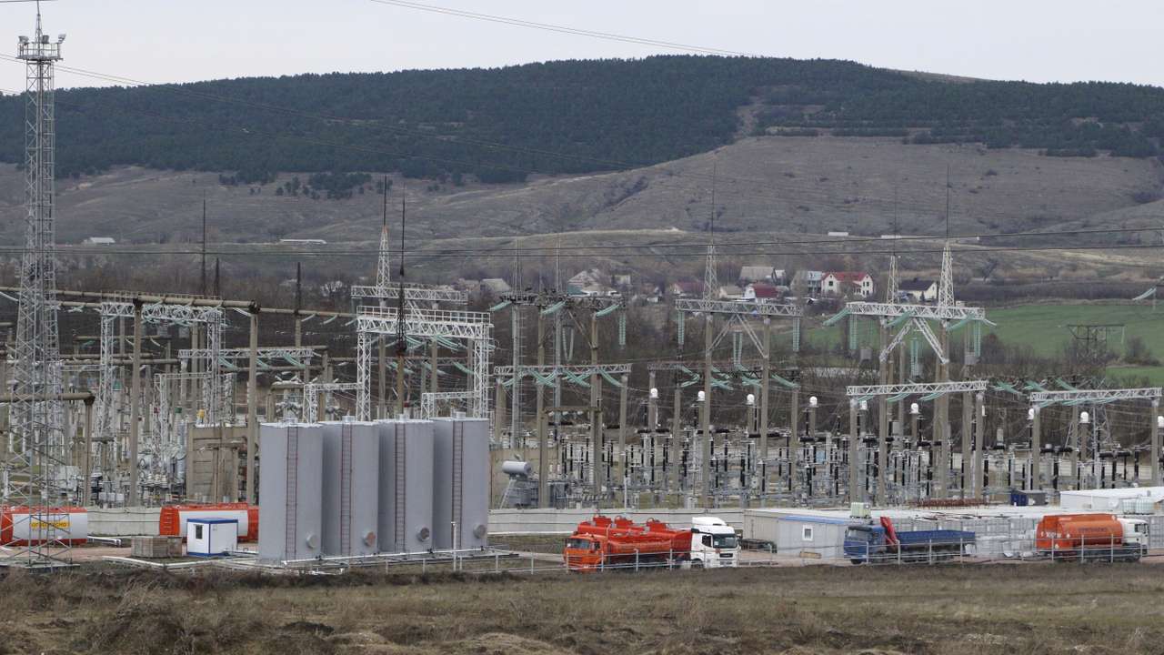 FILE PHOTO: General view shows the facilities of a mobile gas turbine generator, which was turned on due to recent power outages after pylons carrying electricity were blown up, in the settlement of Stroganovka, Simferopol district of Crimea