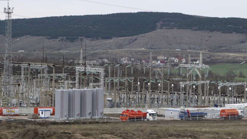 FILE PHOTO: General view shows the facilities of a mobile gas turbine generator, which was turned on due to recent power outages after pylons carrying electricity were blown up, in the settlement of Stroganovka, Simferopol district of Crimea