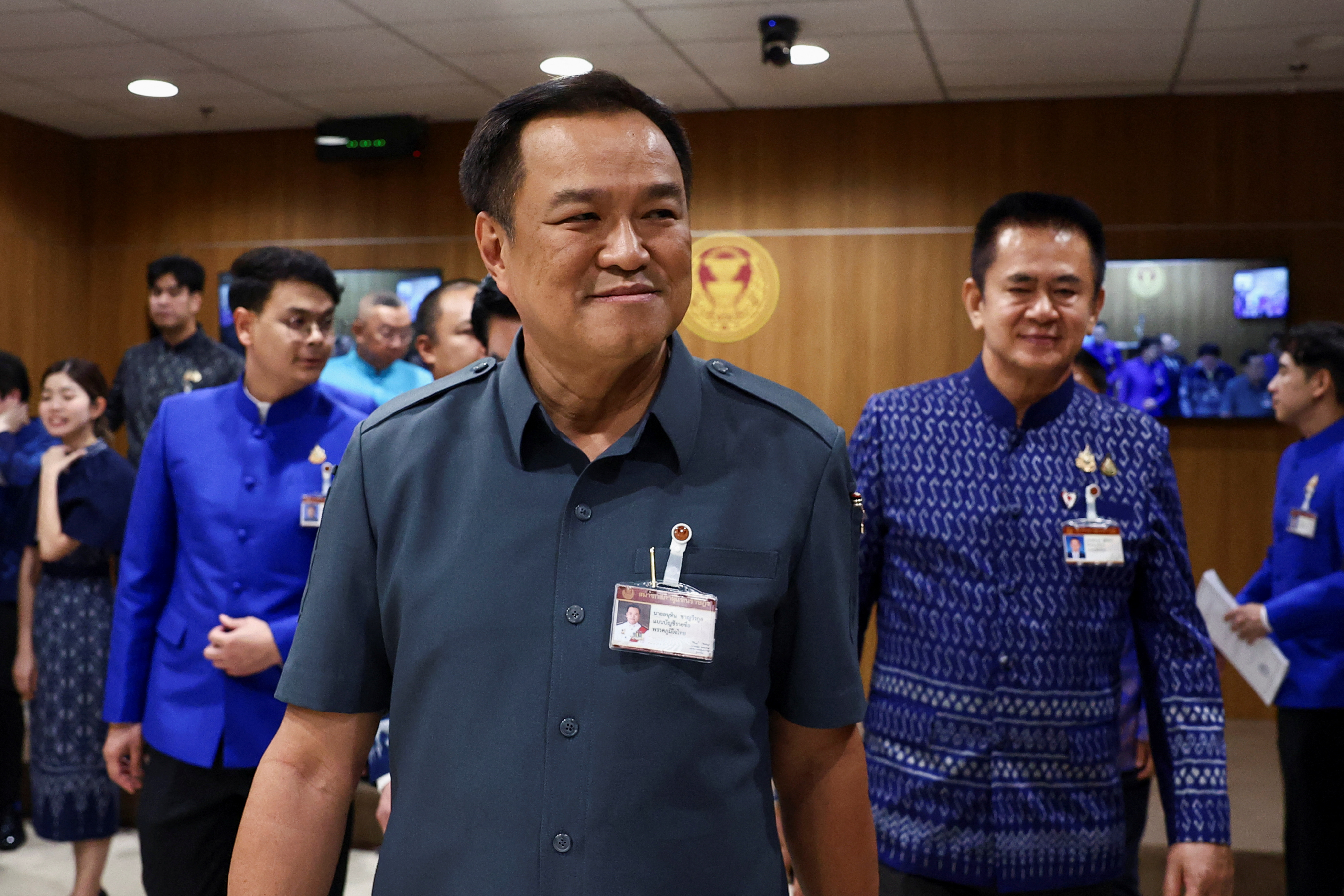 Thailand's caretaker Deputy PM Anutin Charnvirakul and Bhumjaithai Party MPs attend a press conference at the parliament house ahead of a pivotal parliamentary vote on a new PM, in Bangkok