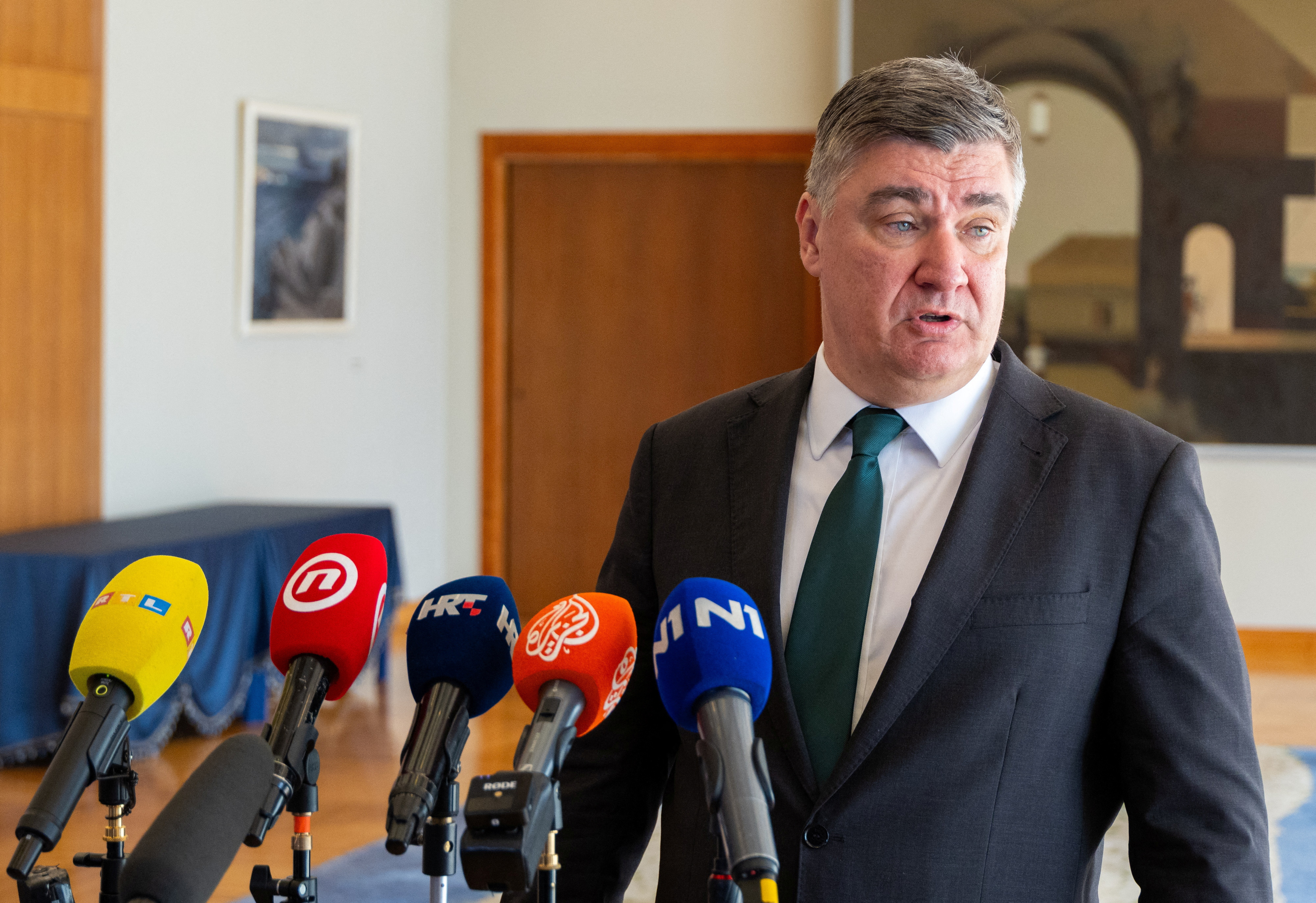 Croatian President Zoran Milanovic talks to the media at the Presidential Palace in Zagreb
