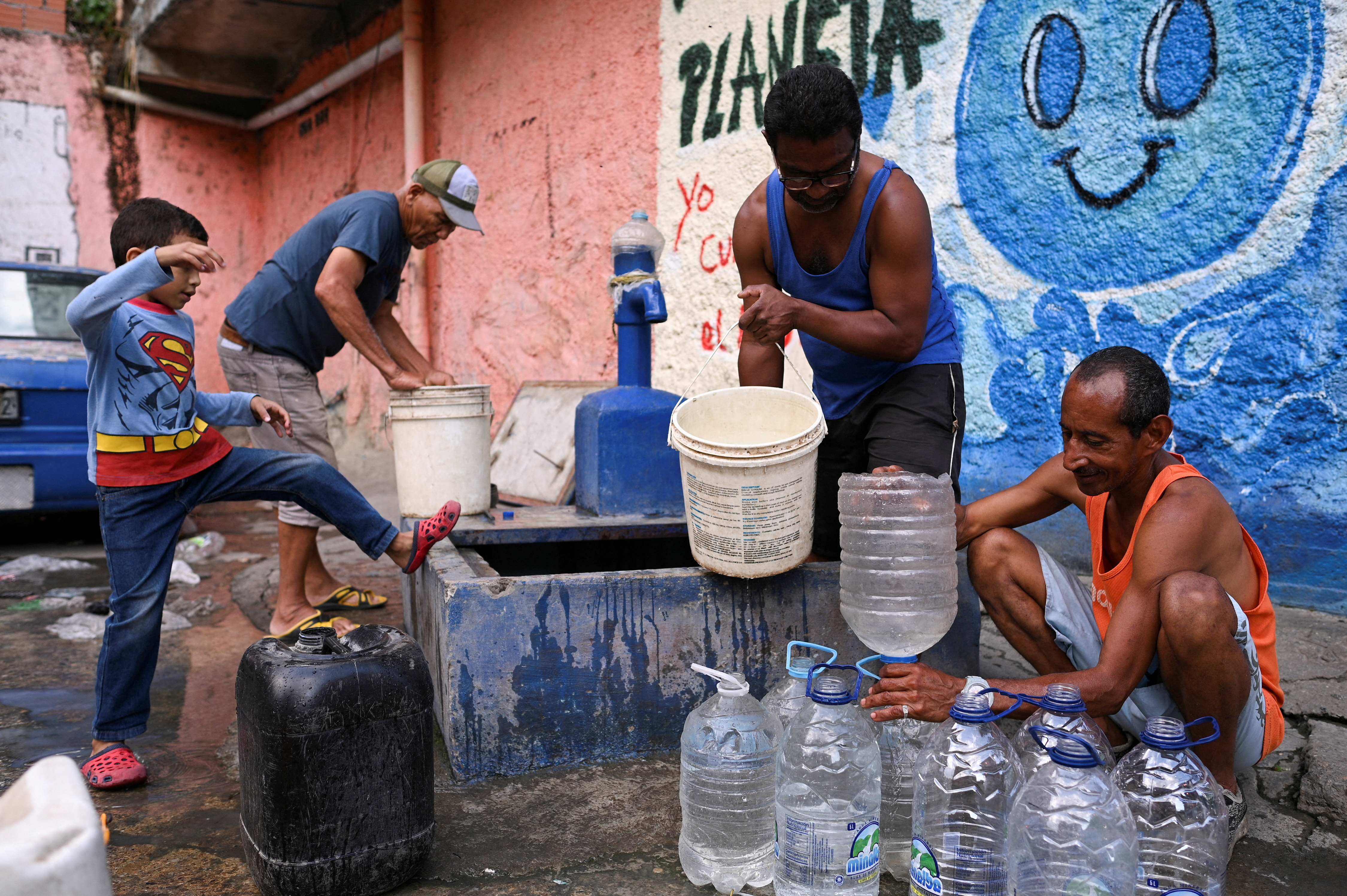 FILE PHOTO: Venezuelans face rising bills and poor services as government cuts spending