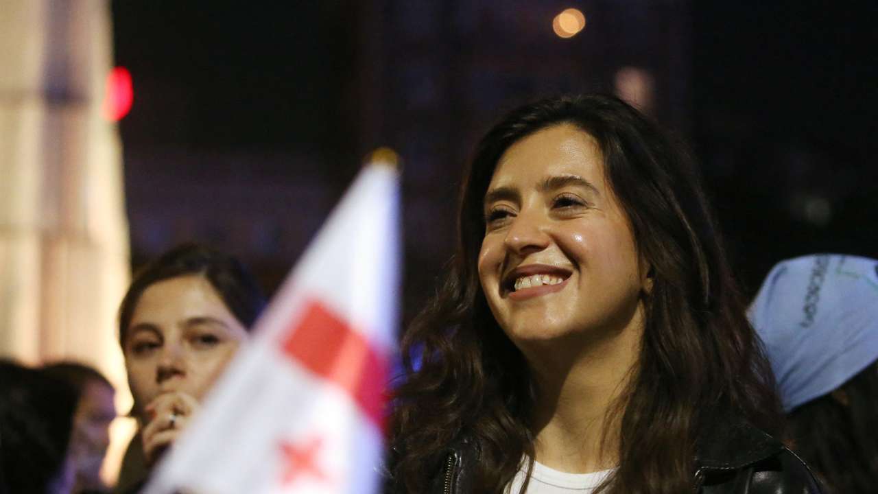 Nonprofit worker Mariam Tsertsvadze takes part in a protest against a bill on "foreign agents" in Tbilisi