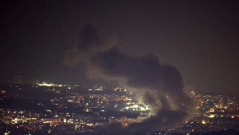 Smoke billows over Beirut's southern suburbs after a strike, amid ongoing hostilities between Hezbollah and Israeli forces