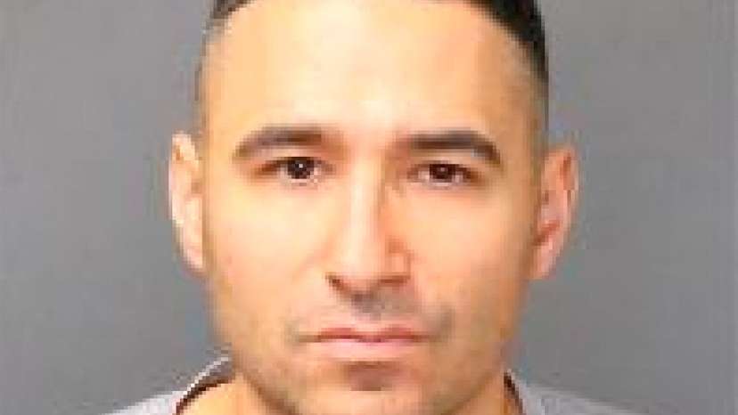 FILE PHOTO: Solomon Pena poses for a jail booking photograph after his arrest by the Albuquerque Police Department