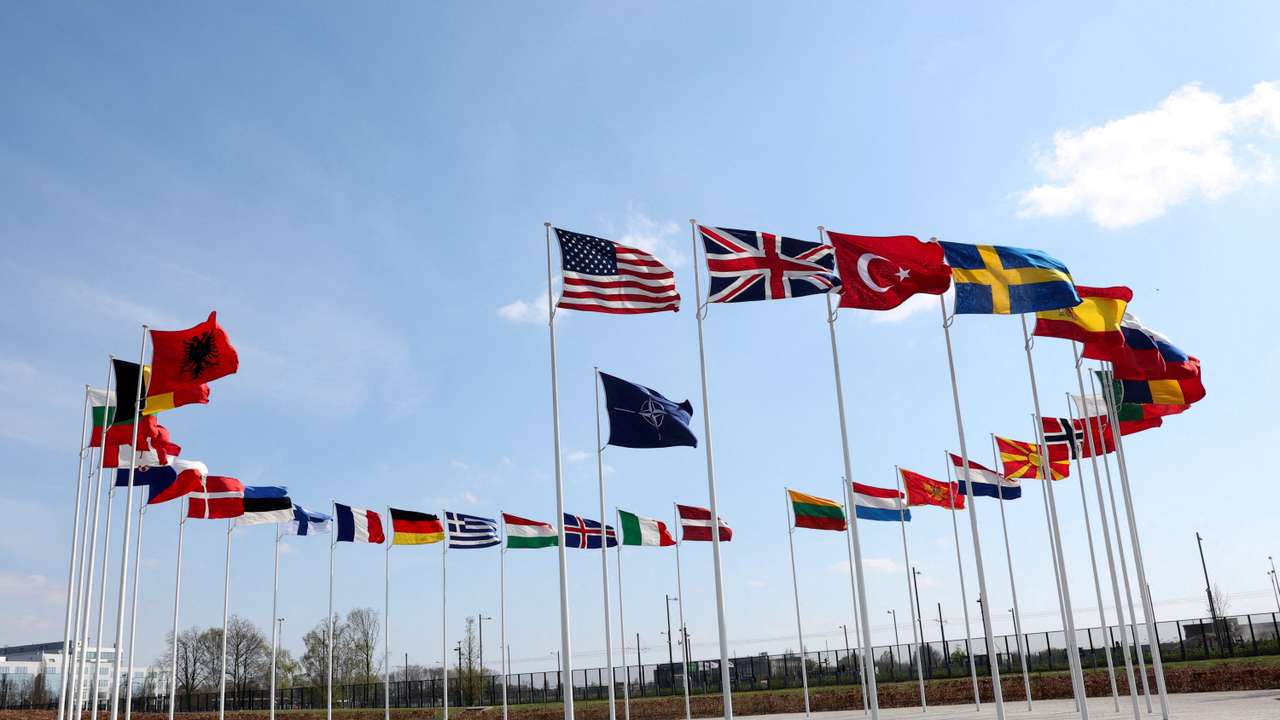 FILE PHOTO: National flags of Alliance's members flutter at NATO headquarters in Brussels