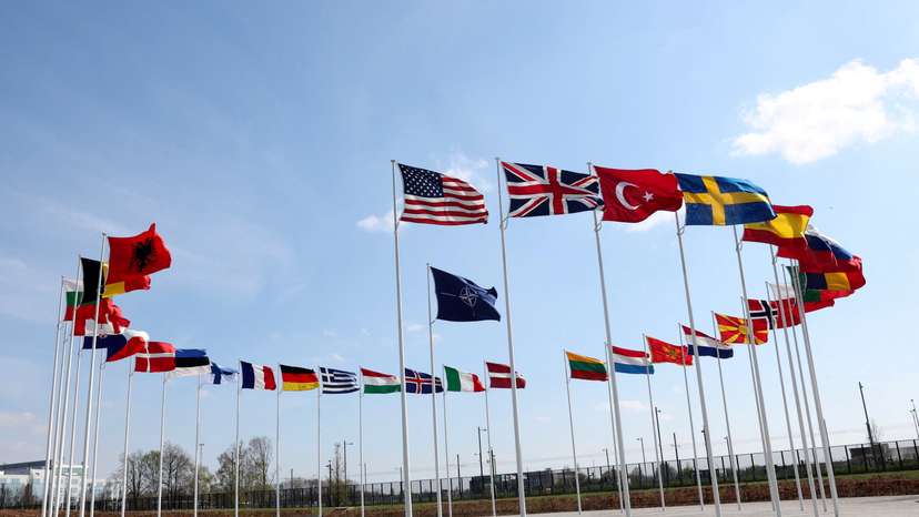 FILE PHOTO: National flags of Alliance's members flutter at NATO headquarters in Brussels