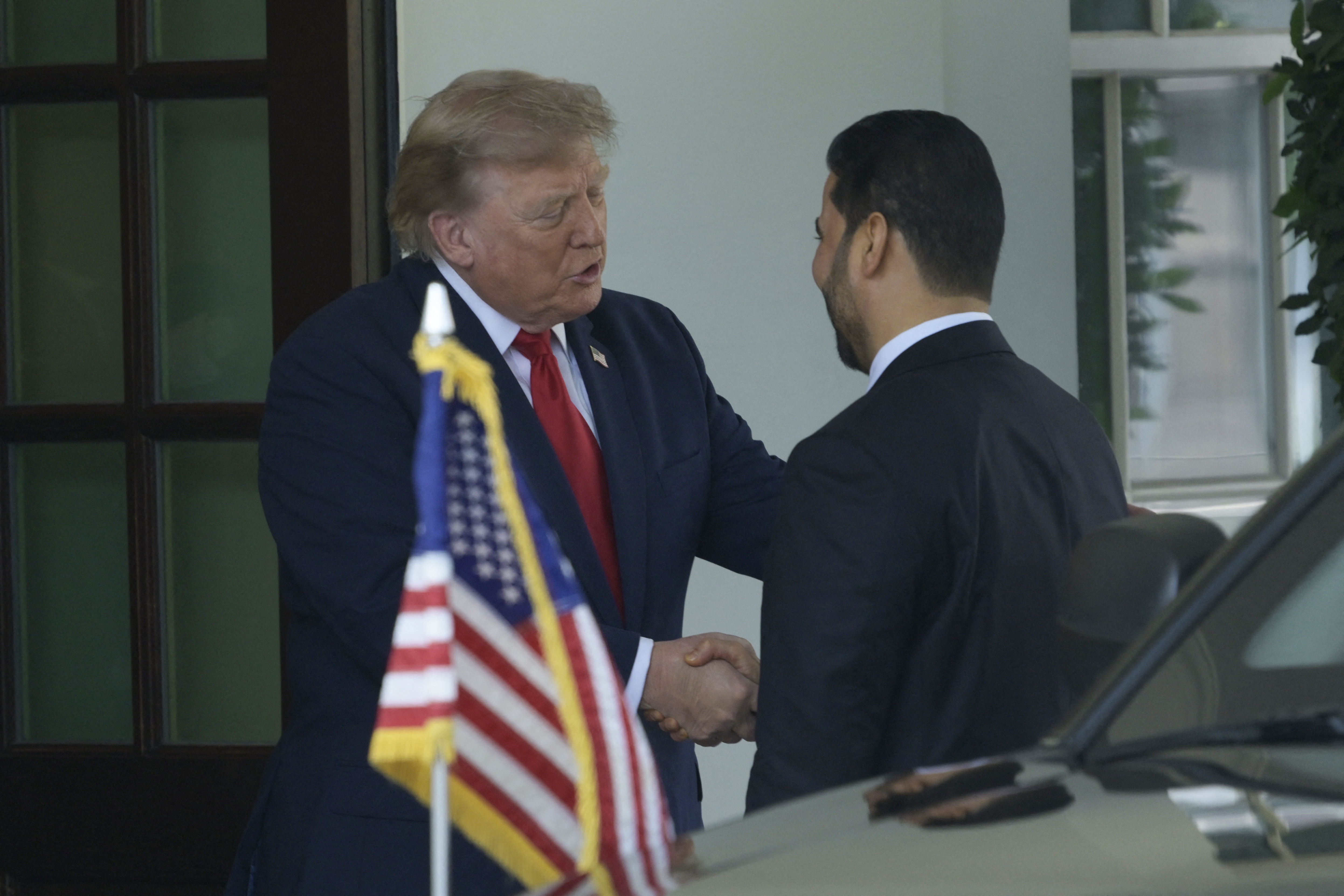Donald Trump, presidente dos EUA, e Ali al-Zaidi, primeiro-ministro do Iraque