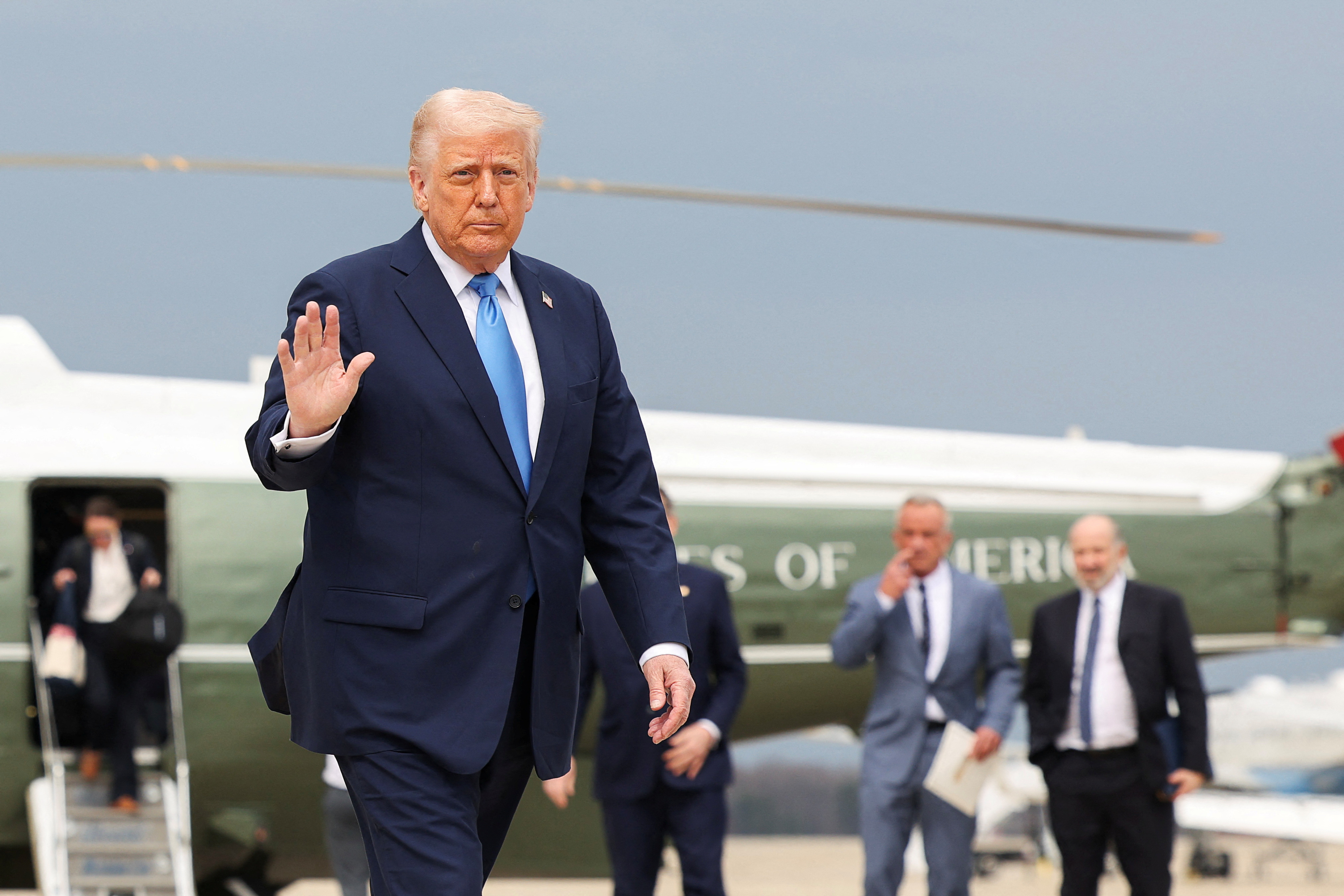 U.S. President Donald Trump boards Air Force One at Joint Base Andrews