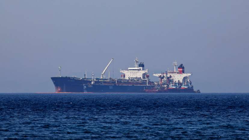 FILE PHOTO: The Liberian-flagged oil tanker Ice Energy transfers crude oil from the Iranian-flagged oil tanker Lana off the shore of Karystos
