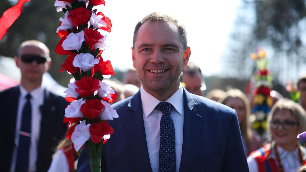 FILE PHOTO: Polish presidential candidate Nawrocki takes part in Palm Sunday procession in Lyse
