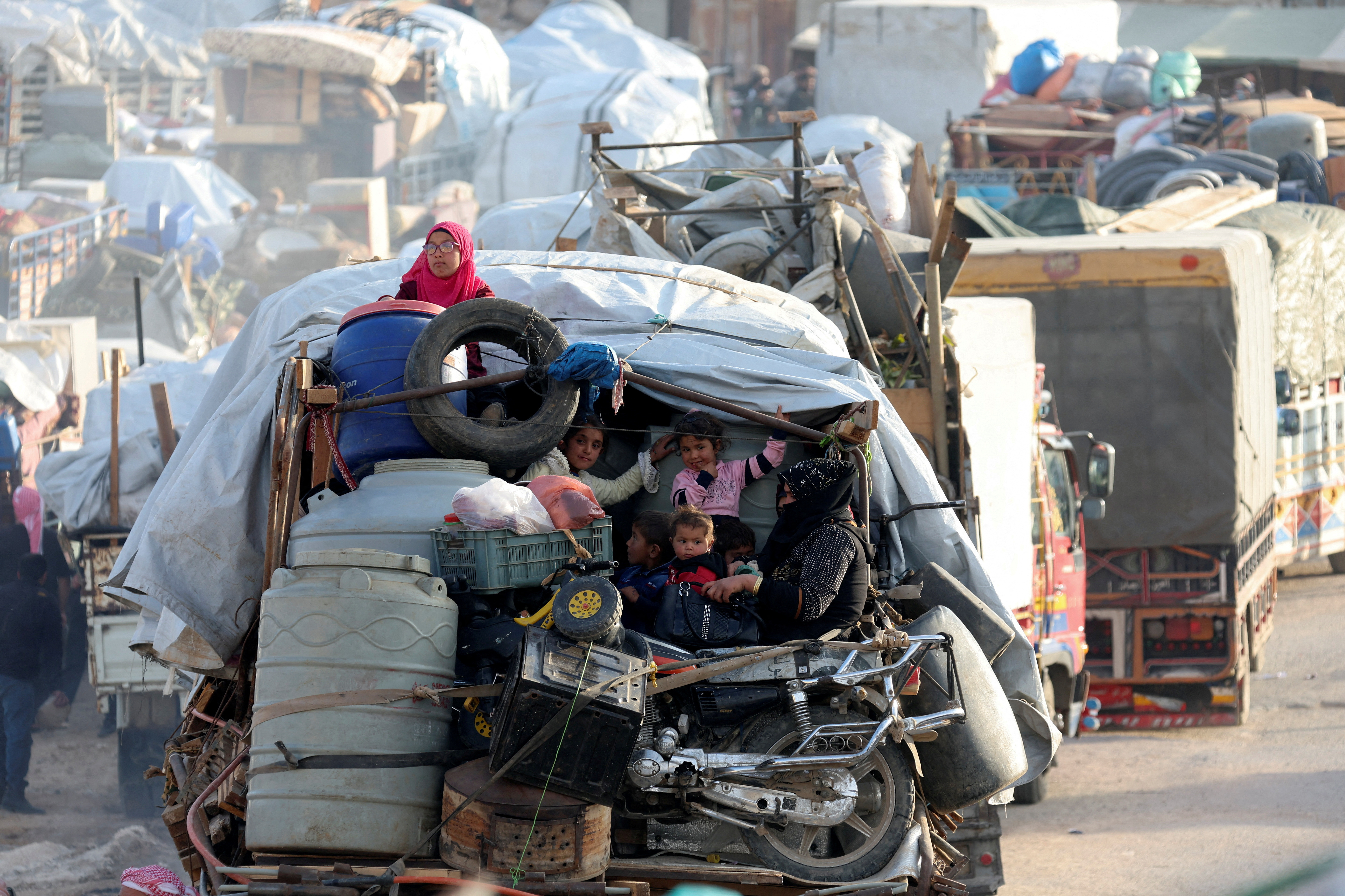 FILE PHOTO: Syrian refugees prepare to return to Syria from Lebanon