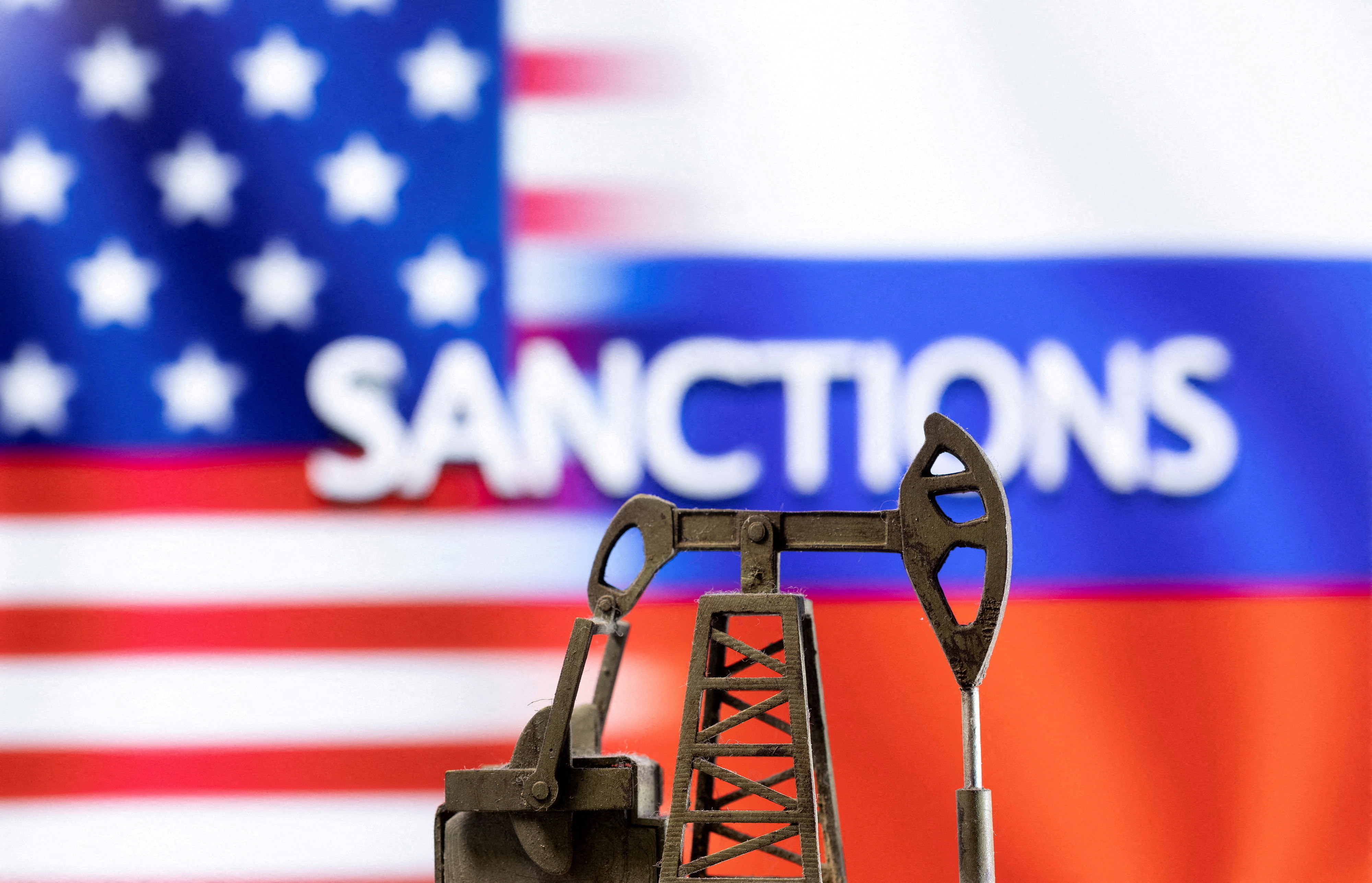 FILE PHOTO: U.S. and Russian flags are seen in this illustration