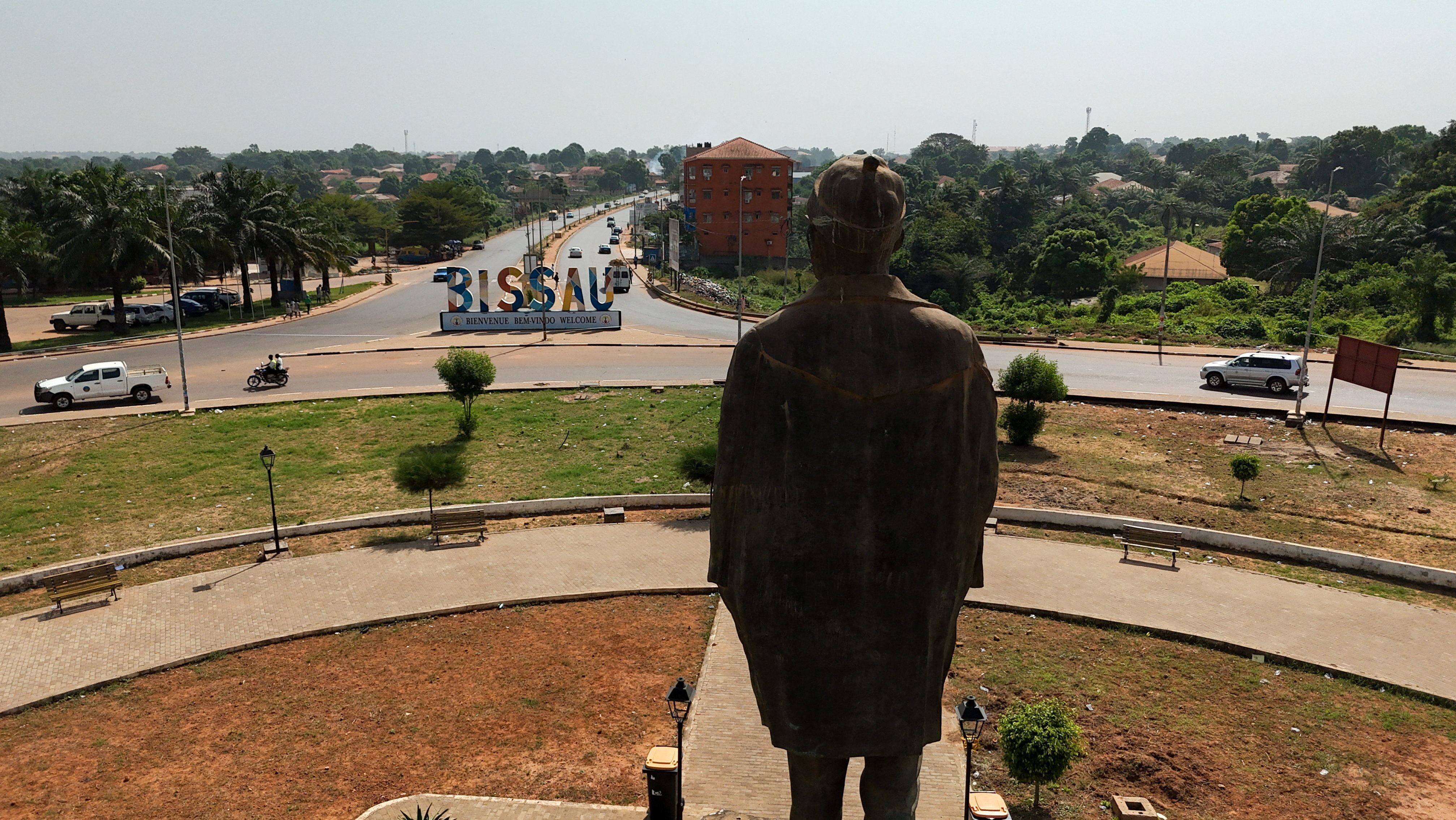 A drone view shows a statue of Amilcar Lopes Cabral