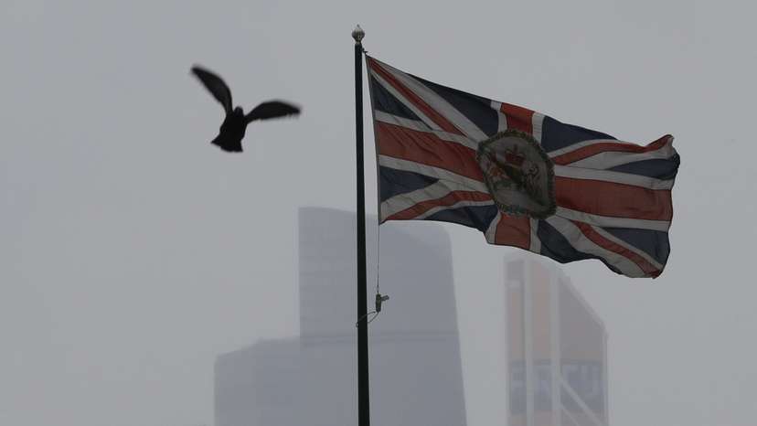 FILE PHOTO: The British flag flies on the embassy building in front of the Moscow International Business Center in Moscow