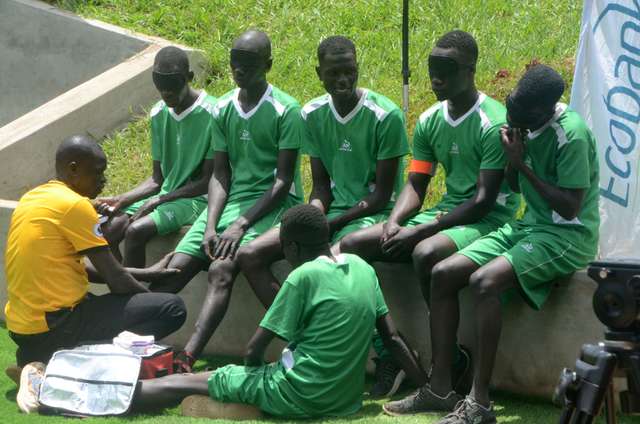 photo taken shows some of blind players rest during half time football competition