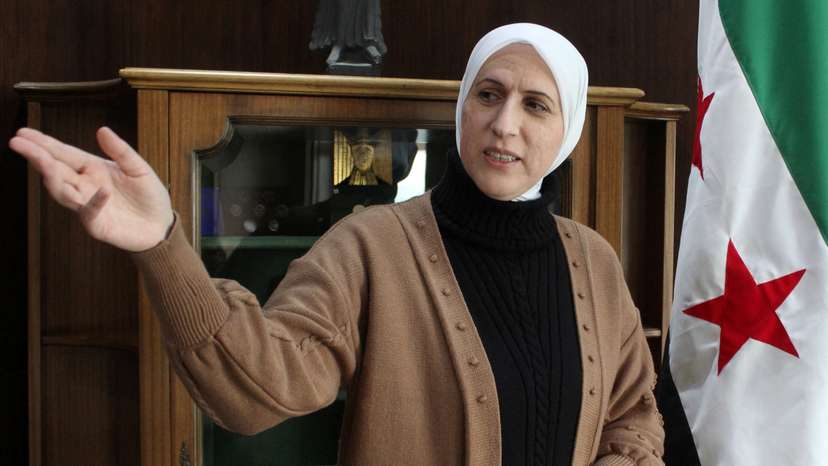 Syria's new central bank governor Maysaa Sabreen gestures at her office in the central bank in Damascus