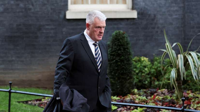 FILE PHOTO: Deputy Chairman of the Conservative Party Anderson walks at 10 Downing Street in London