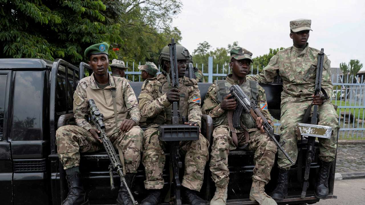 FILE PHOTO: M23 rebels escort FDLR to Rwandan border for repatriation after capture in Goma
