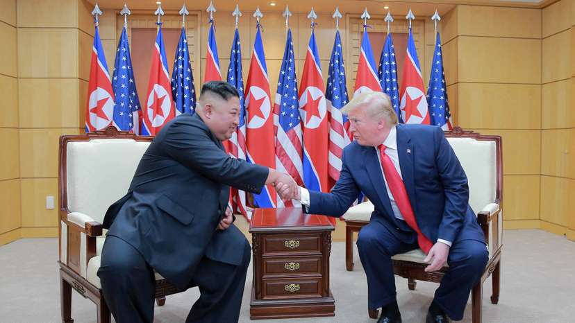 FILE PHOTO: Trump meets with North Korean leader Kim Jong Un at DMZ on border of North and South Korea