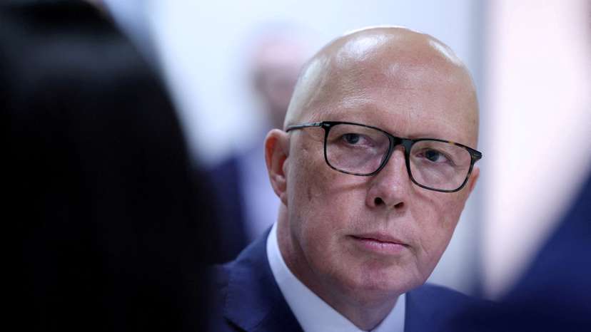 FILE PHOTO: Liberal Party leader Peter Dutton listens during a visit to youth mental health foundation in Western Sydney