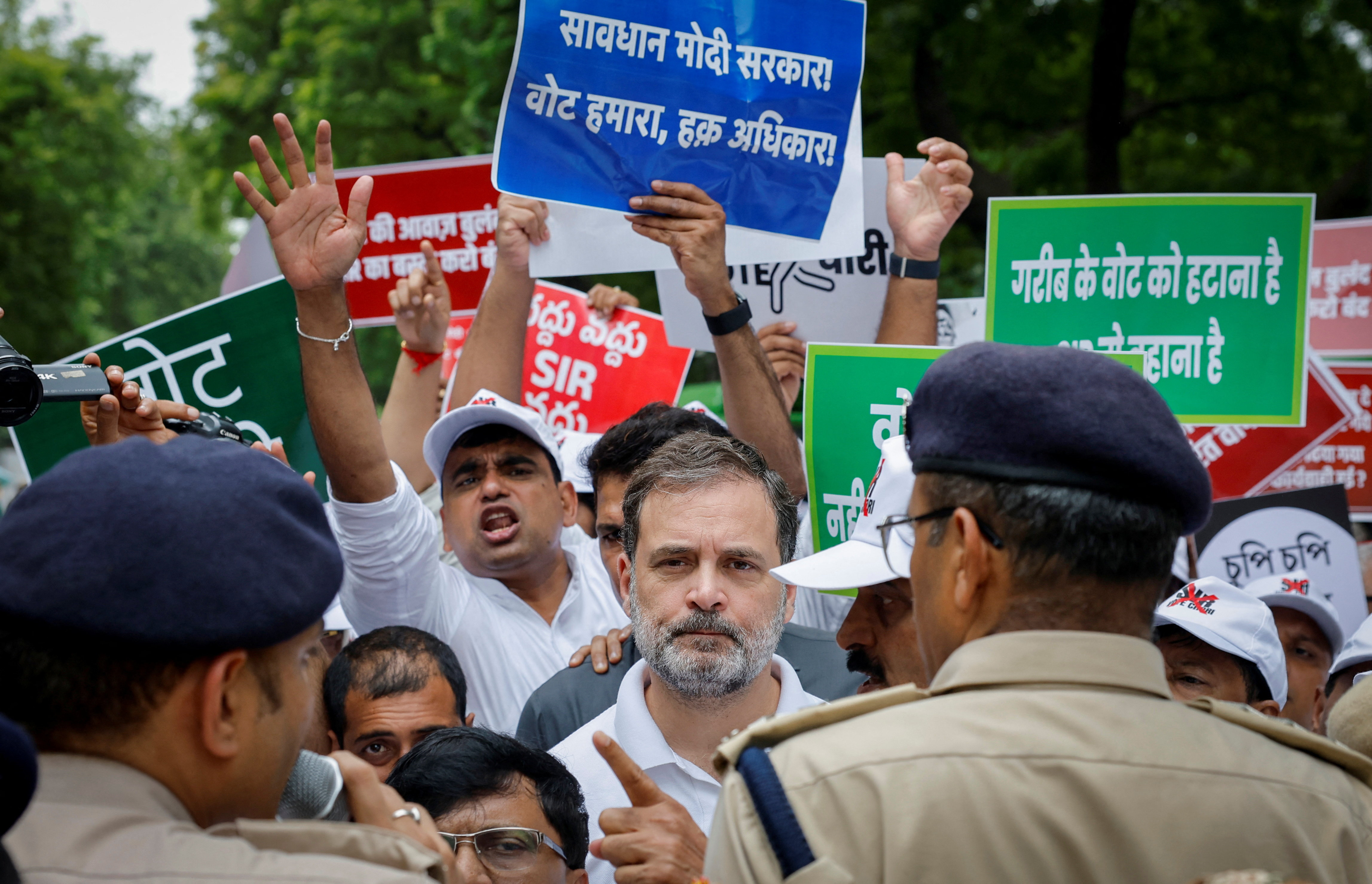 Indian opposition lawmakers protest against what they say are electoral malpractices, in New Delhi
